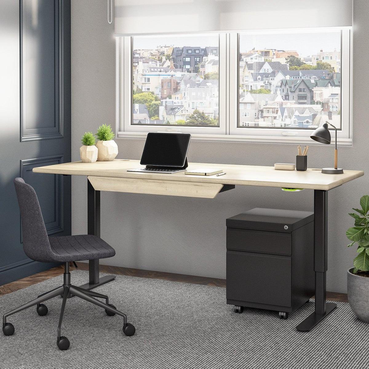 Jaxson Standing Desk with matching Premium Drawer in the home office.