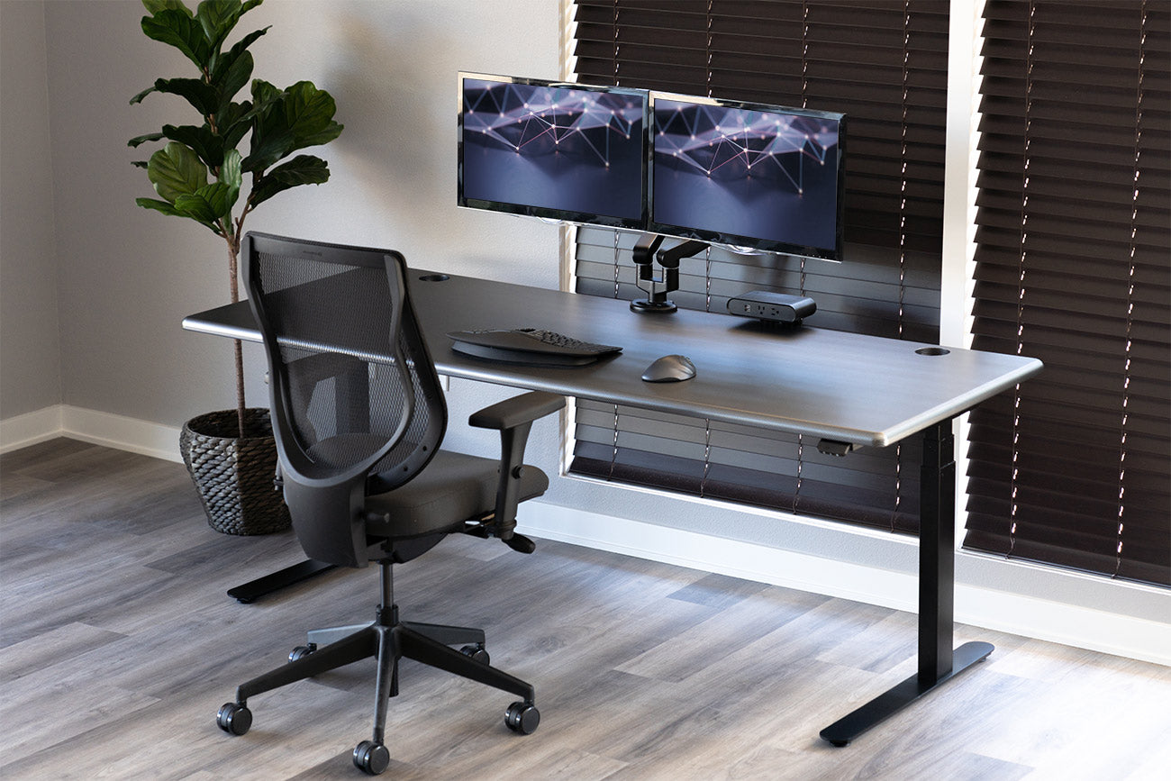 iMovR Lander Stanidng Desk in Carbon Fibers on Black Base, with McHale Chair, Topview Dual Monitor Arm, and Ellipse Power Block