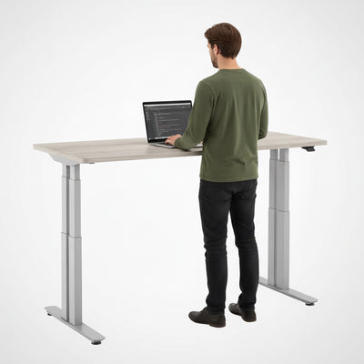 P1 Elite Plus 4-Leg Standing Desk with person standing at it