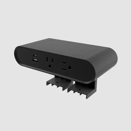 Black Ellipse Qi wireless edge-mount power block with dual AC outlets, USB-A, and USB-C ports.