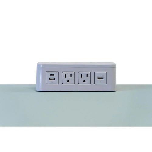 White Dyna Wireless Qi Charger & Power Block with dual AC outlets, USB-A, and USB A+C adapter.