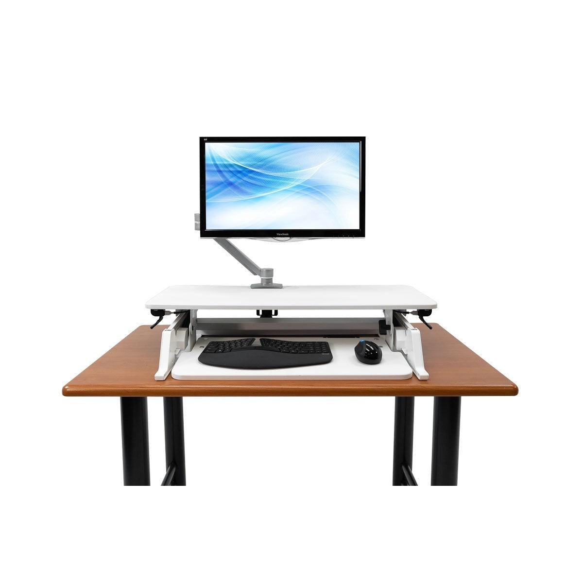 ZipLift+ with Monitor Arm on a Desk