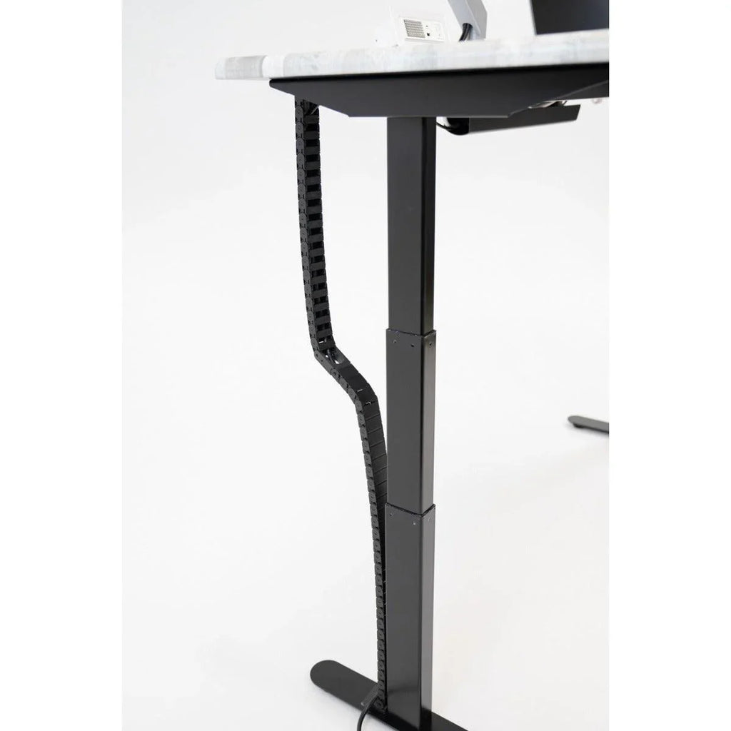 Desk at maxiumum height with Tucker Cable Chain installed.