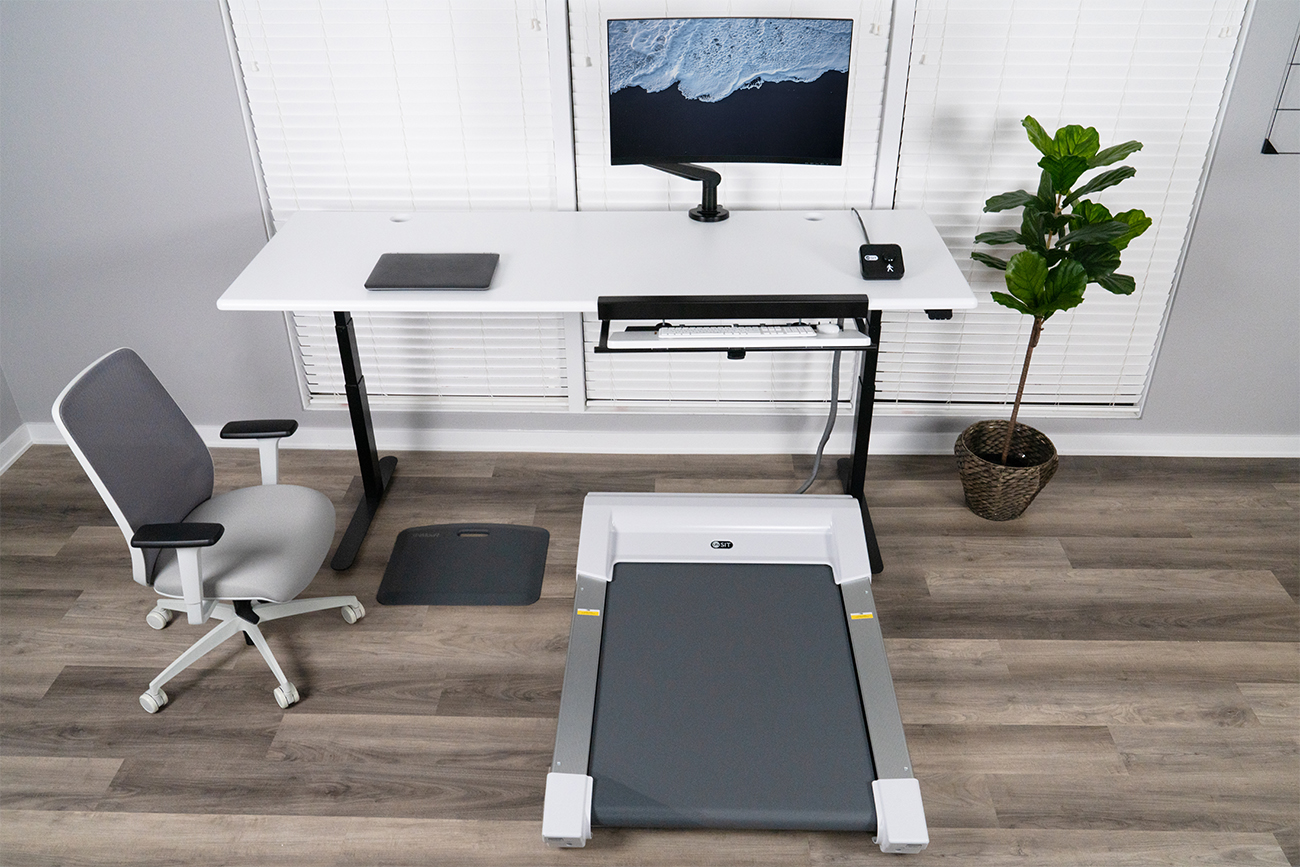 iMovR Lander treadmill Desk in Sit-Stand-Walk configuration with Unsit treadmill base and SteadyType Exo keyboard tray